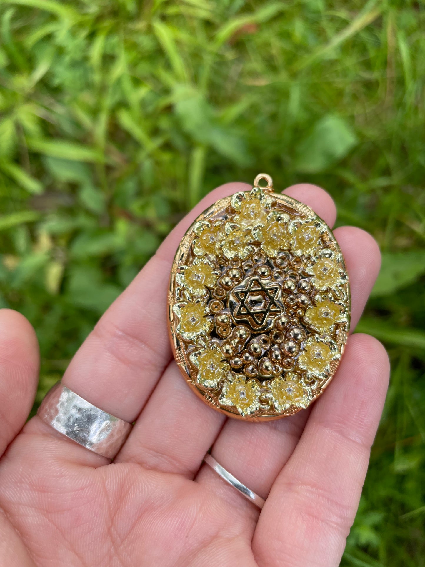 Golden Flora: Gold plated Flowers Magen David Oval Pendant