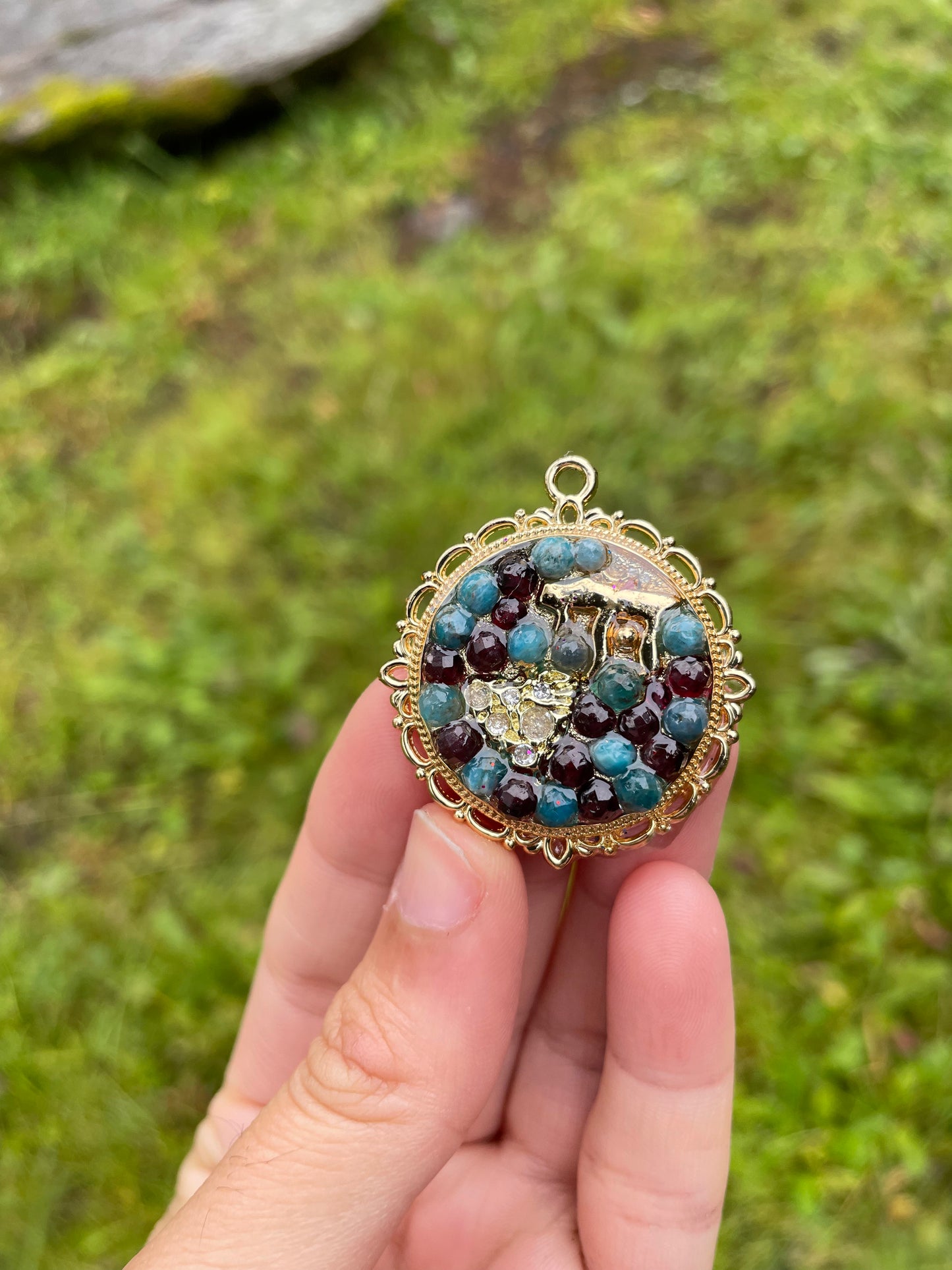 Love Israel: Chai & Heart gold plated, Apatite and Garnet Gemstones Round Decorated Resin Pendant