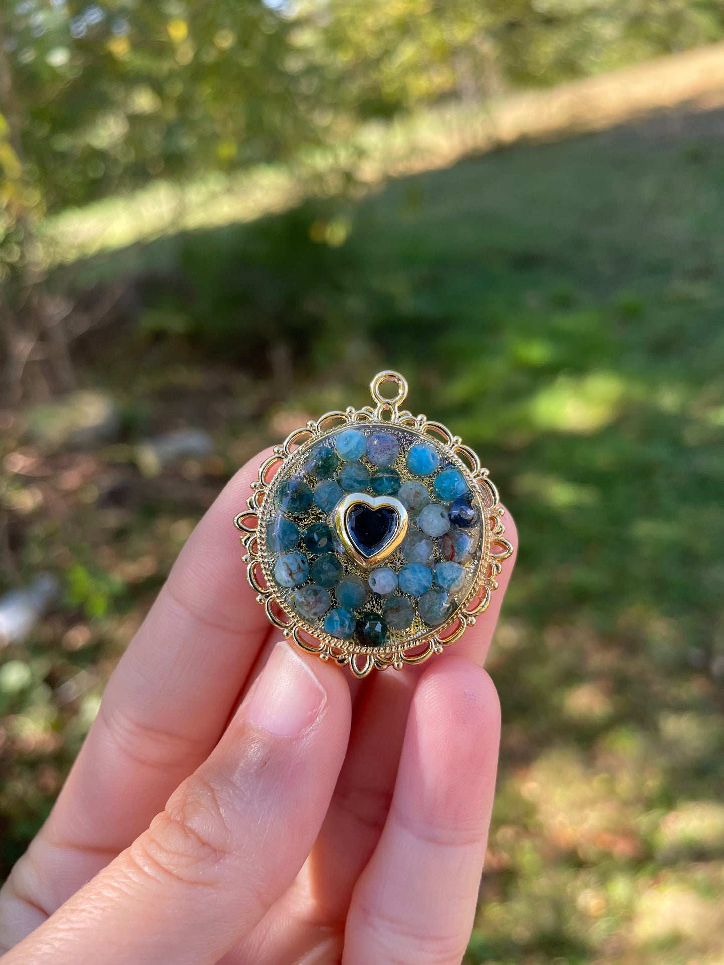 Zirconia Blue Heart and Apatite Blue Gemstones in Gold Plated Decorated Pendant