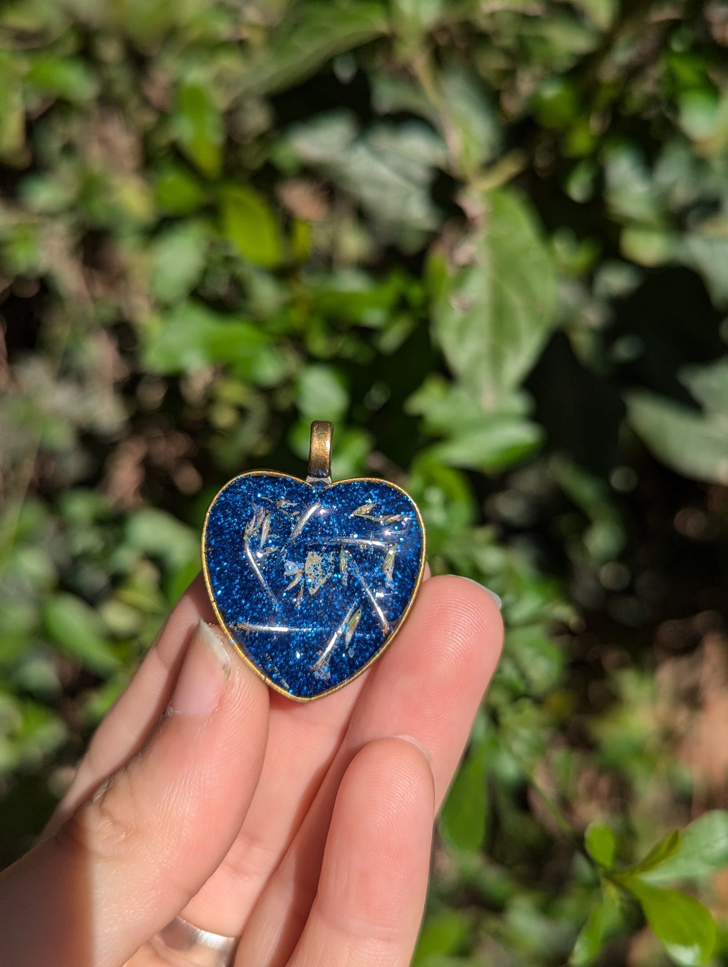 Israel Encapsulated: White Flowers, Blue Glitter and Silver Star of David