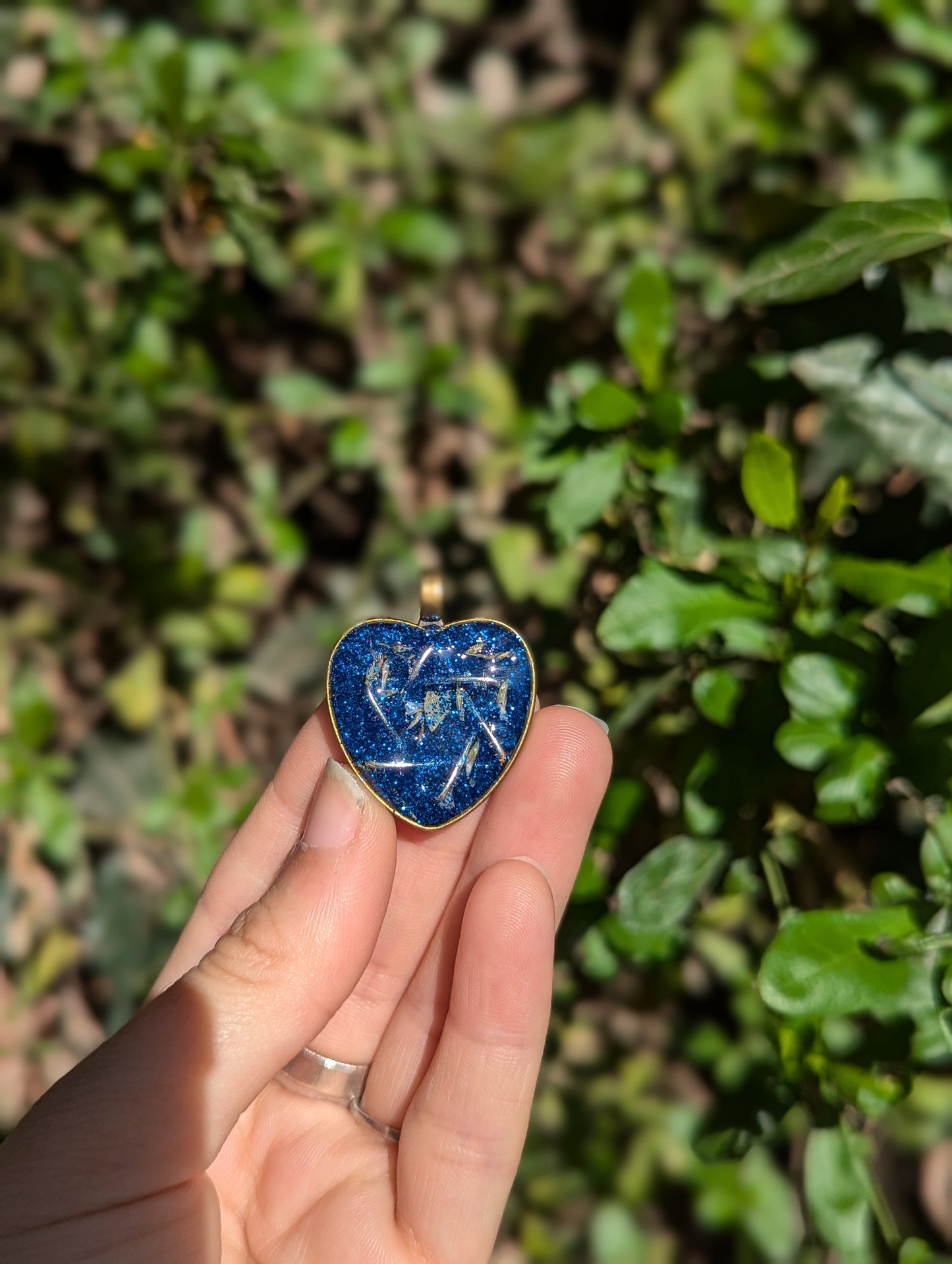 Israel Encapsulated: White Flowers, Blue Glitter and Silver Star of David