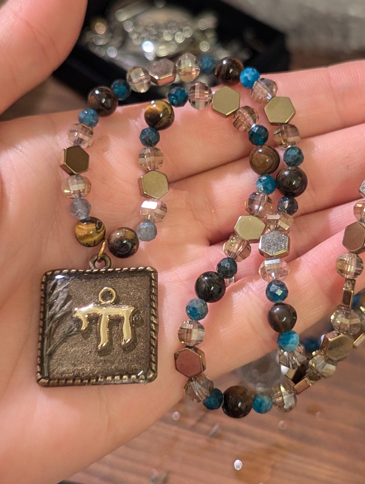 Israel Encapsulated: Gold Chai Cushion Resin Pendant with White and Purple Flowers