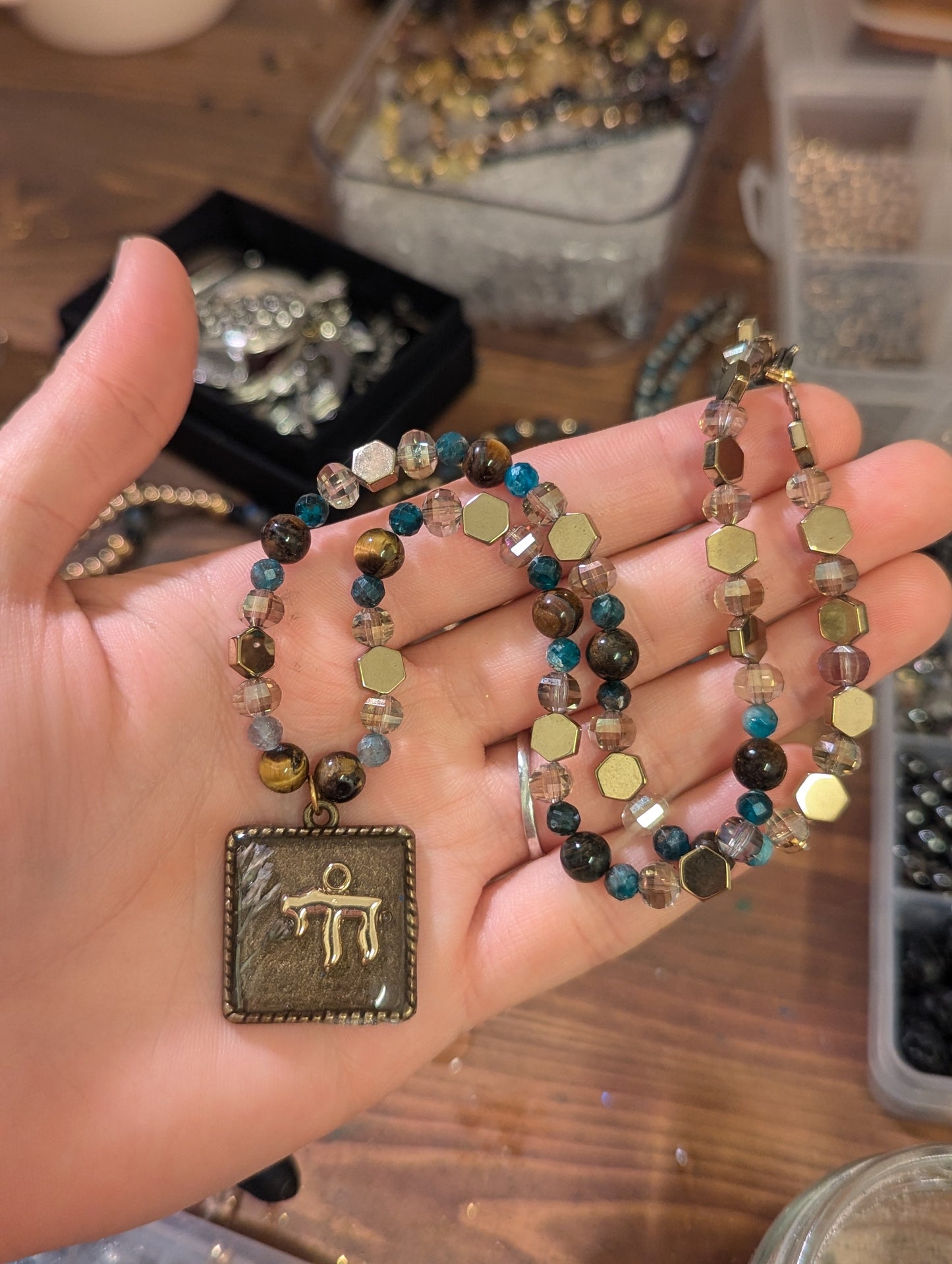 Israel Encapsulated: Gold Chai Cushion Resin Pendant with White and Purple Flowers