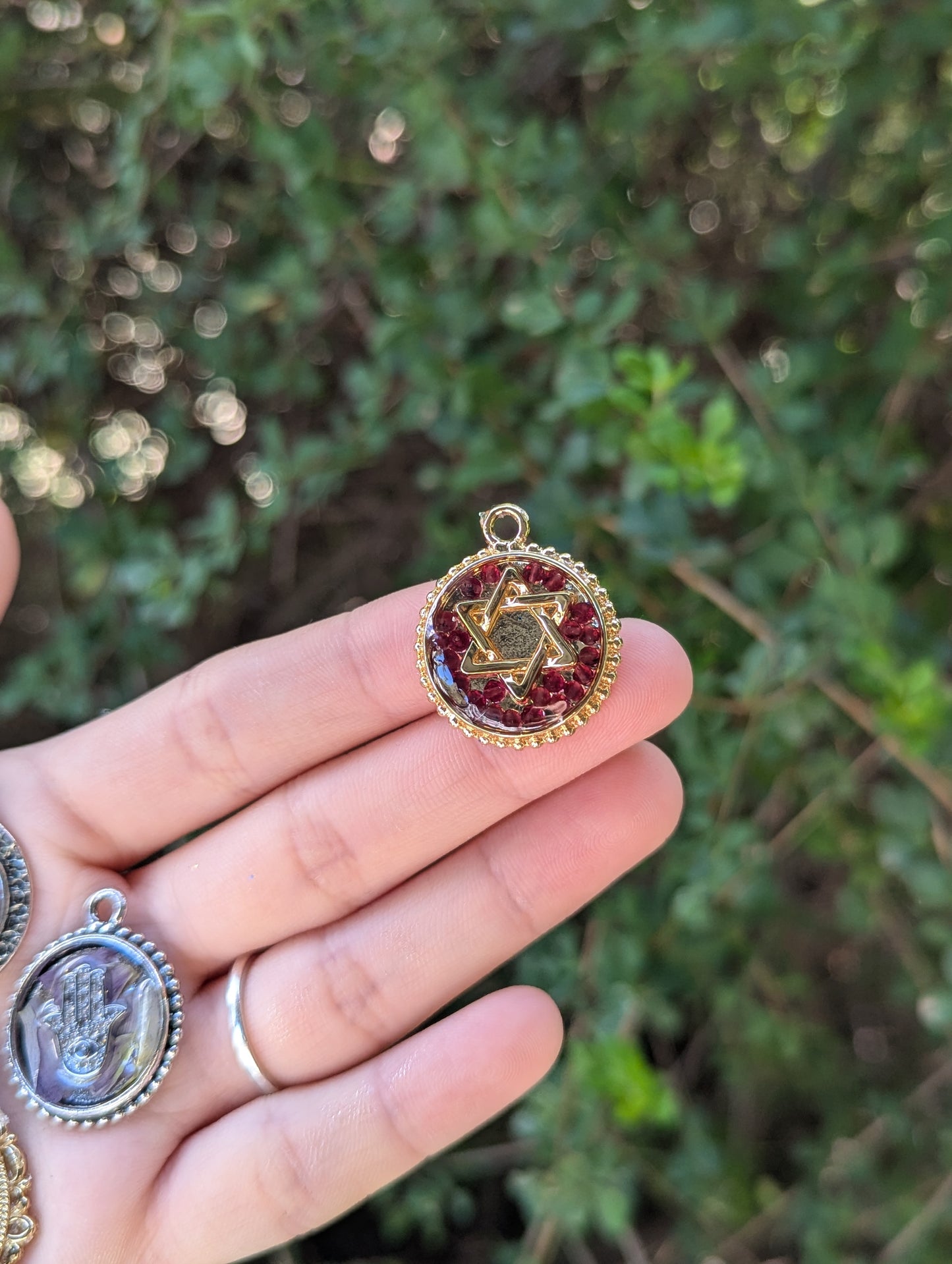Resin Round Gold Plated Magen David with Garnet Gemstones Pendant
