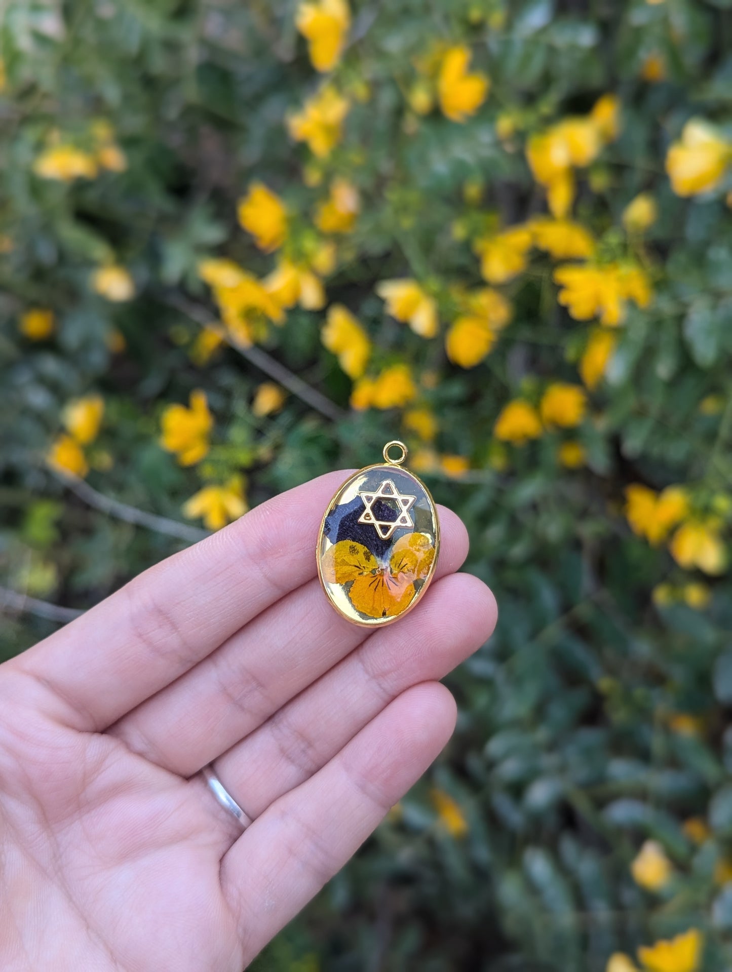 Meital Pendant with Yellow Purple Flower and Gold Plated Magen David in Resin