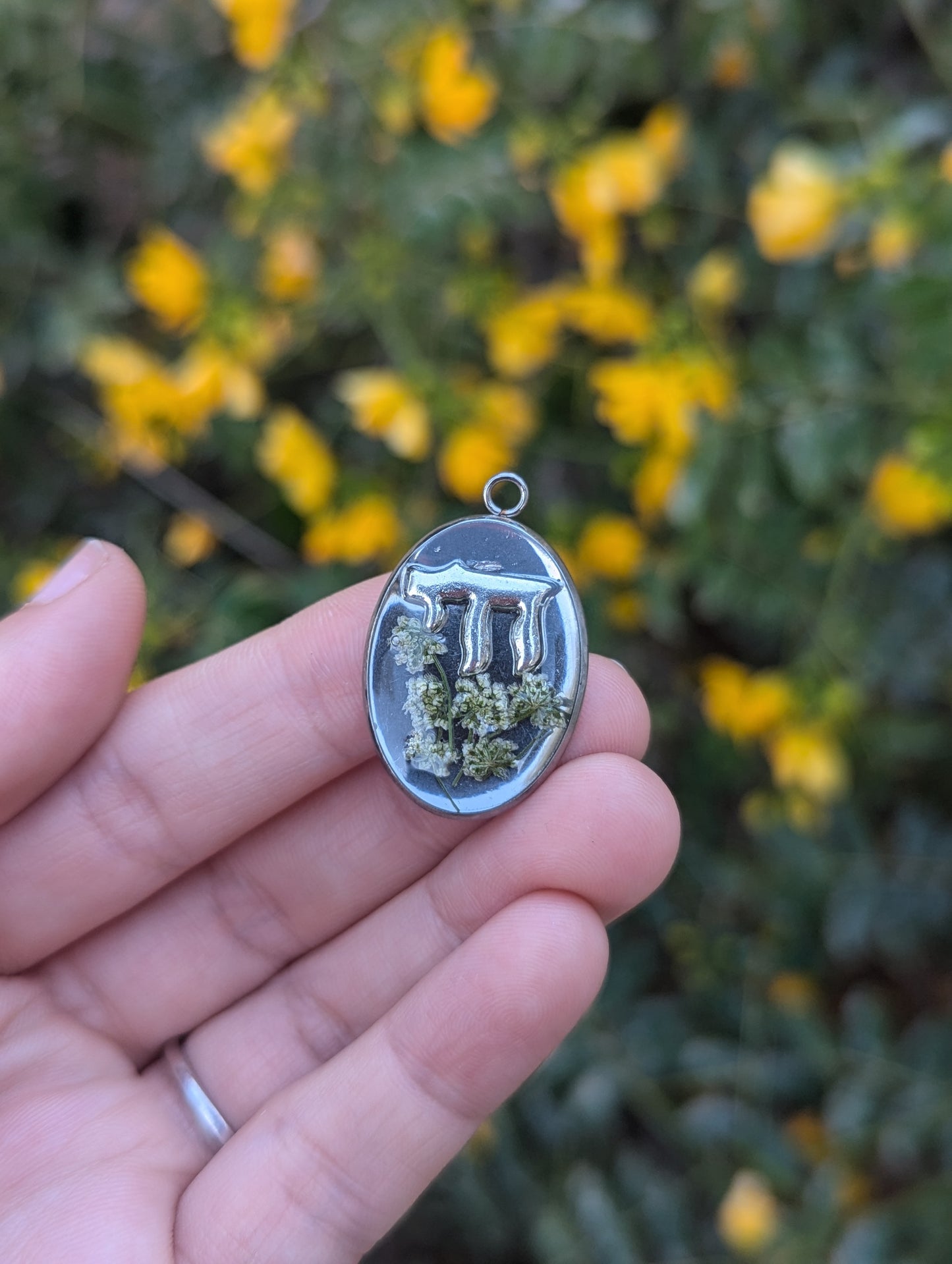 Tohar (purity) Pendant with Tiny White Israeli Flowers and Silver Chai in Resin