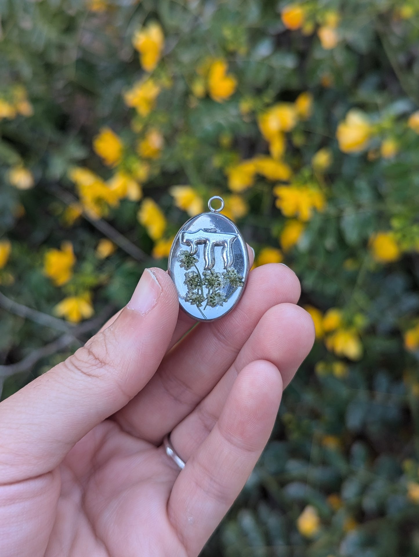 Tohar (purity) Pendant with Tiny White Israeli Flowers and Silver Chai in Resin
