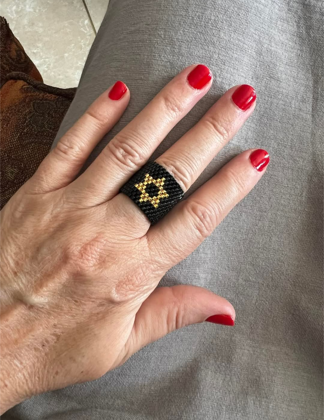 By Perla: Black and Gold Filled Star of David Ring
