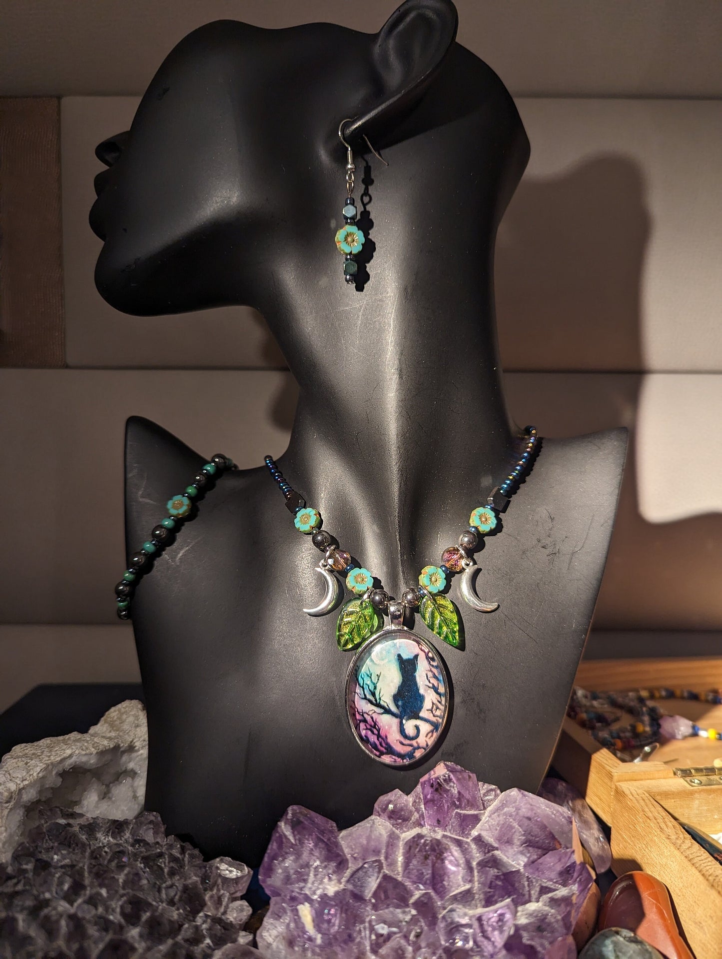 Black Cat on a Tree Branch, Purple Green Sky with Crescent Silver Moons, Green Leaf Pendants and Czech Crystal Flower Bracelet and Earrings