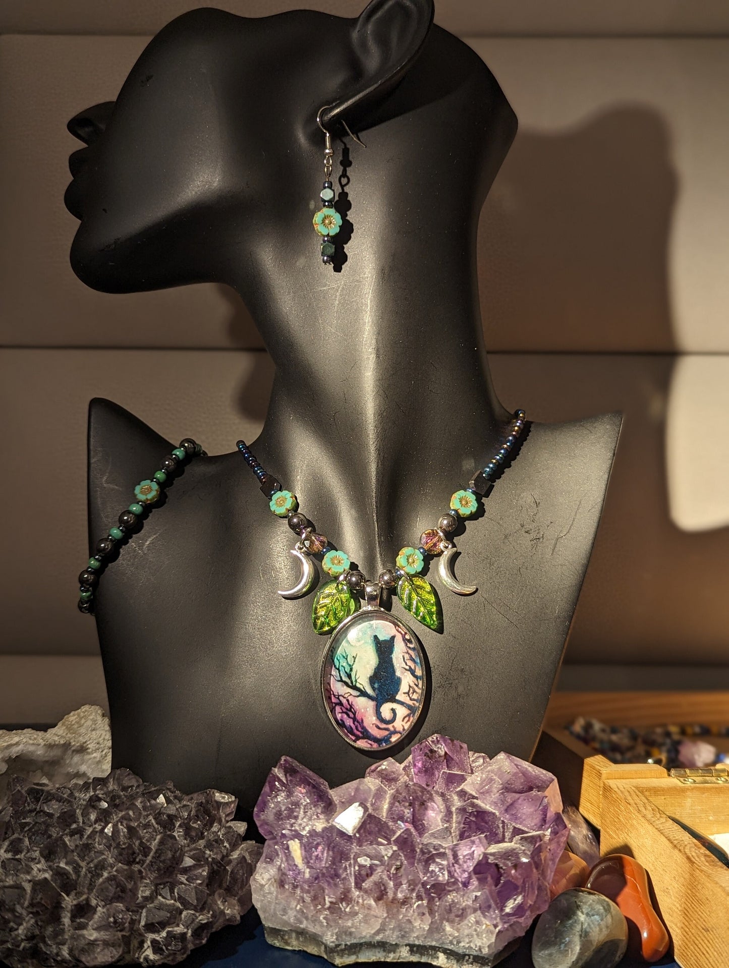 Black Cat on a Tree Branch, Purple Green Sky with Crescent Silver Moons, Green Leaf Pendants and Czech Crystal Flower Bracelet and Earrings