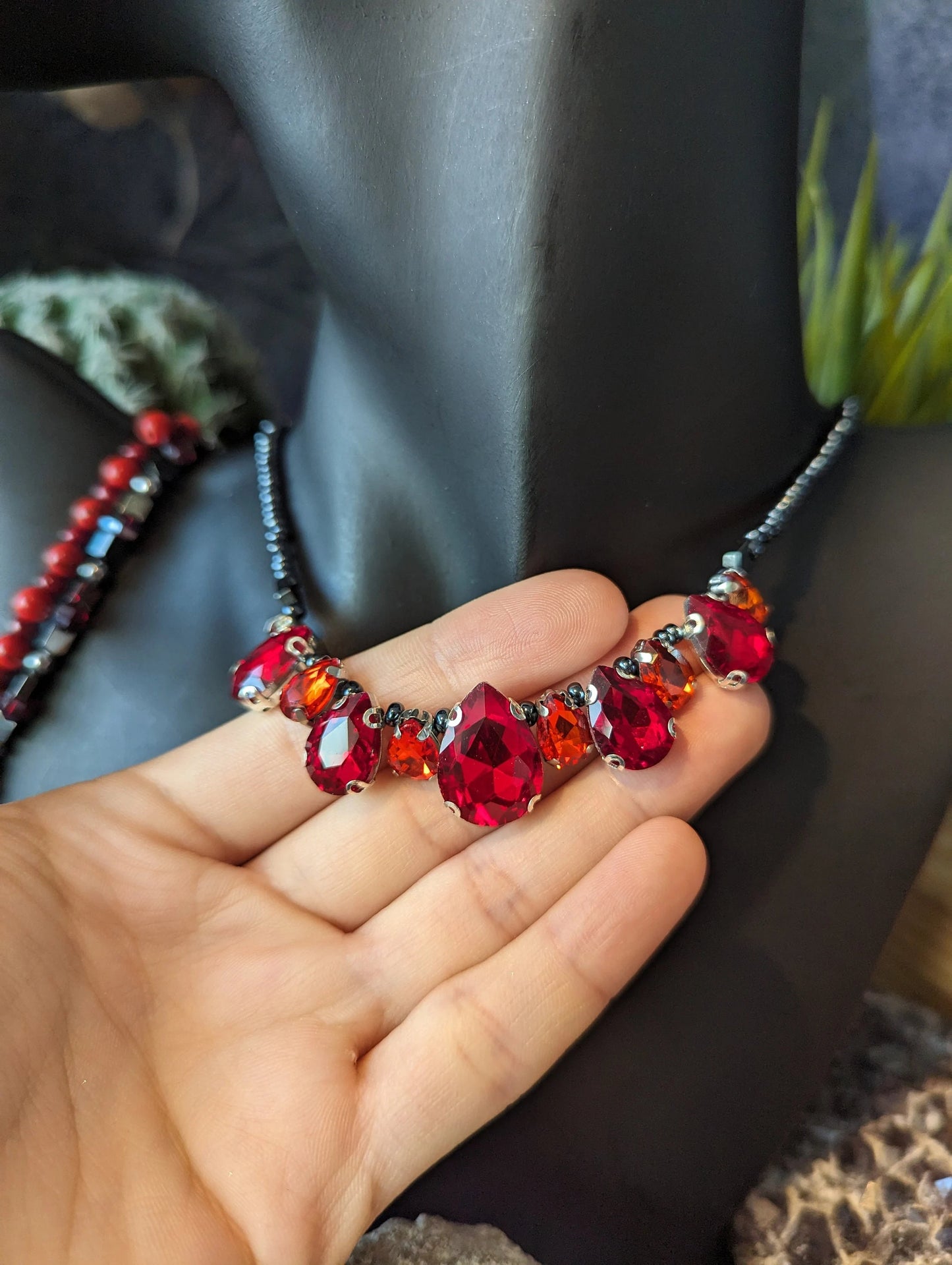 Red Shimmer Set: Nine Red Drop Pendants Shining in Varying Shades, Red Drop Earrings and 2 Red Hematite styled Beaded Bracelets