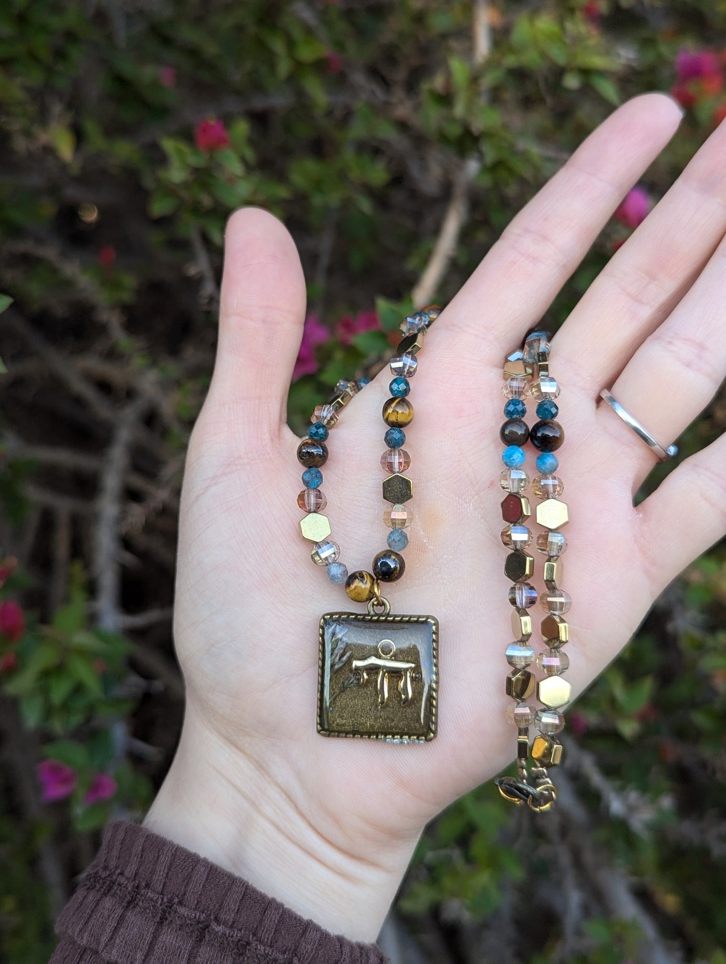 Israel Encapsulated: Gold Chai Cushion Resin Pendant with White and Purple Flowers