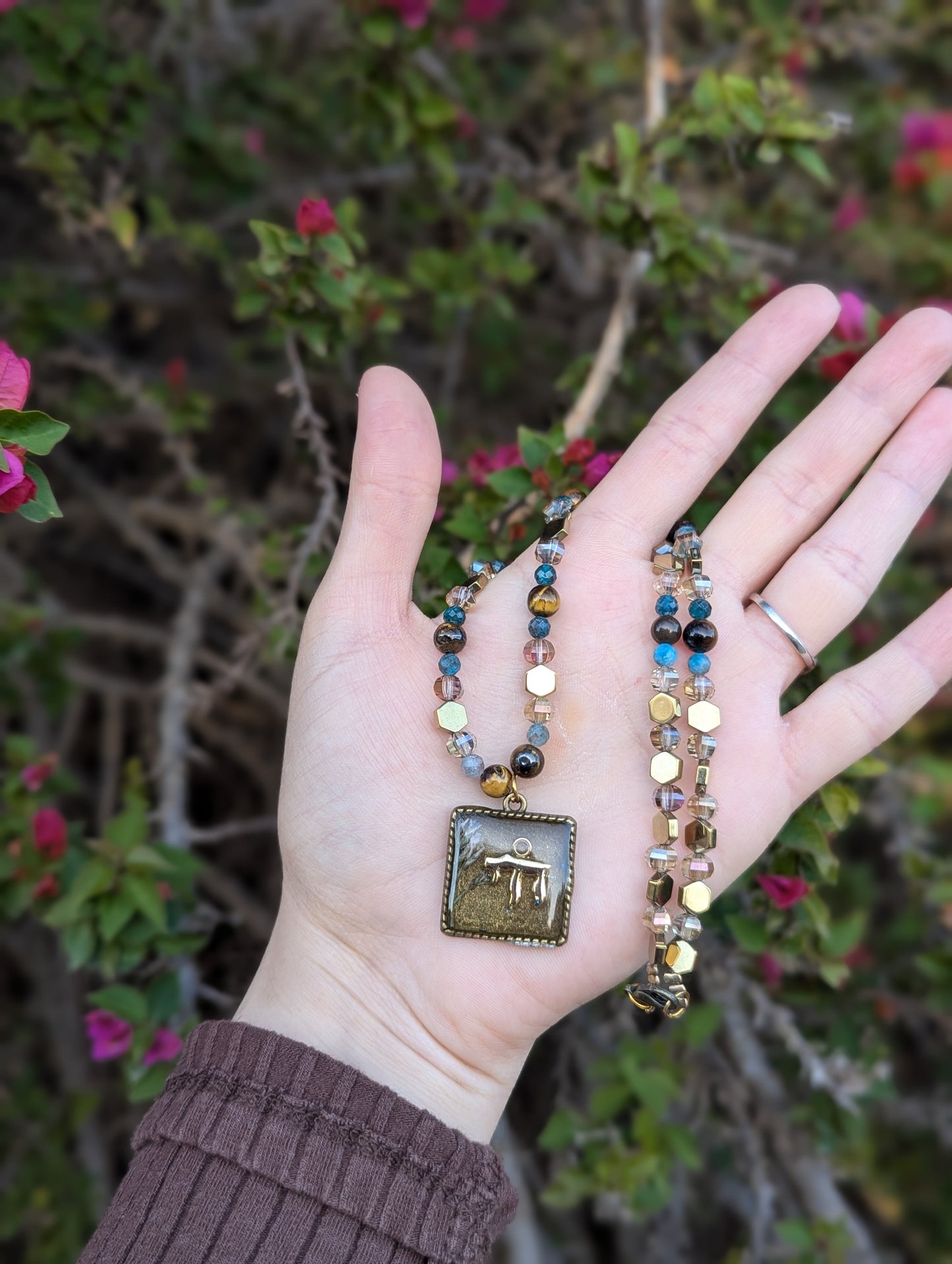 Israel Encapsulated: Gold Chai Cushion Resin Pendant with White and Purple Flowers
