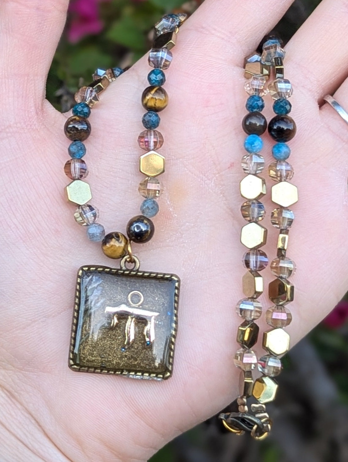 Israel Encapsulated: Gold Chai Cushion Resin Pendant with White and Purple Flowers