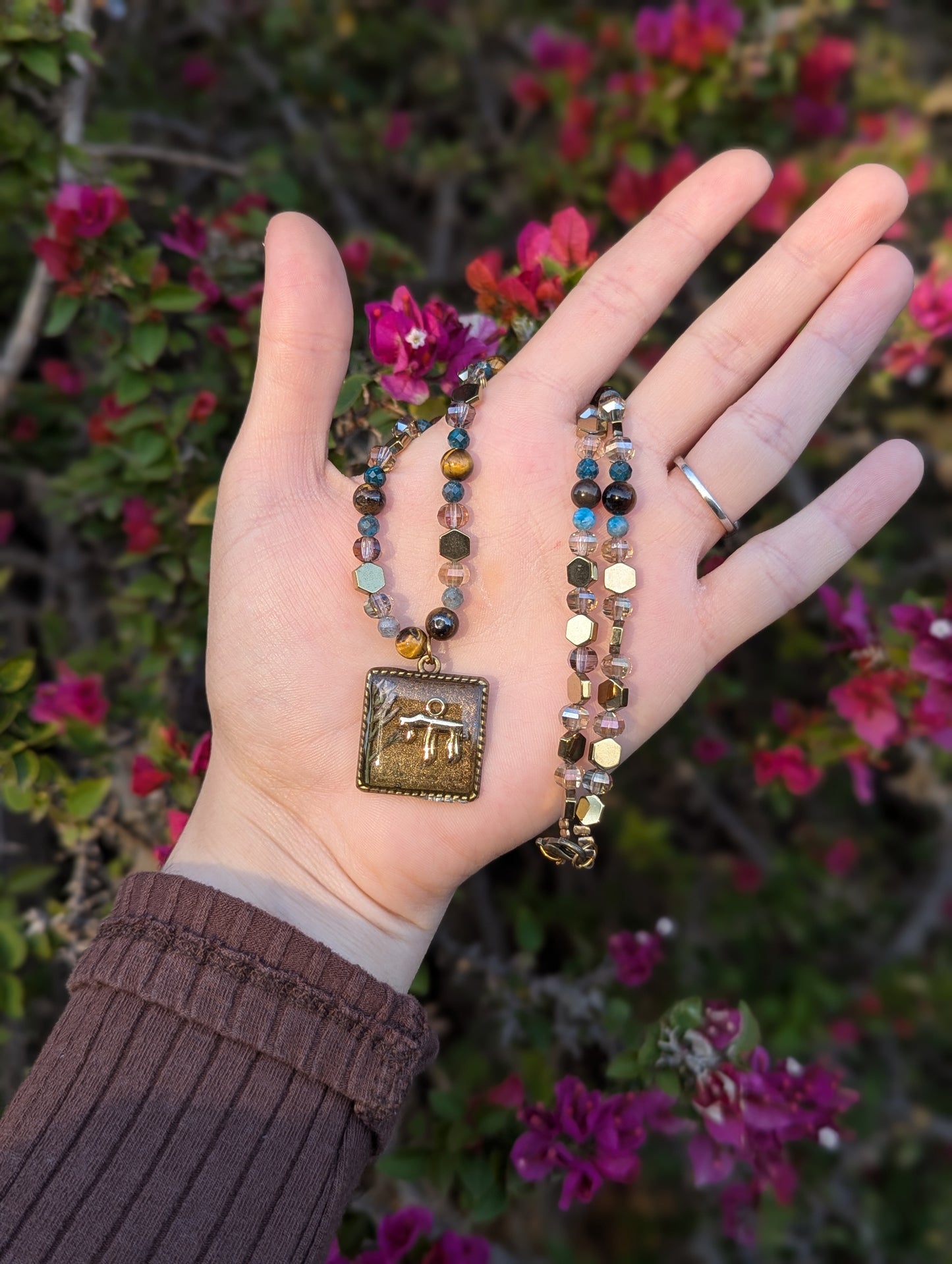 Israel Encapsulated: Gold Chai Cushion Resin Pendant with White and Purple Flowers