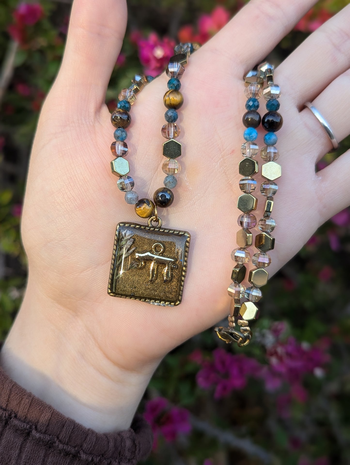 Israel Encapsulated: Gold Chai Cushion Resin Pendant with White and Purple Flowers