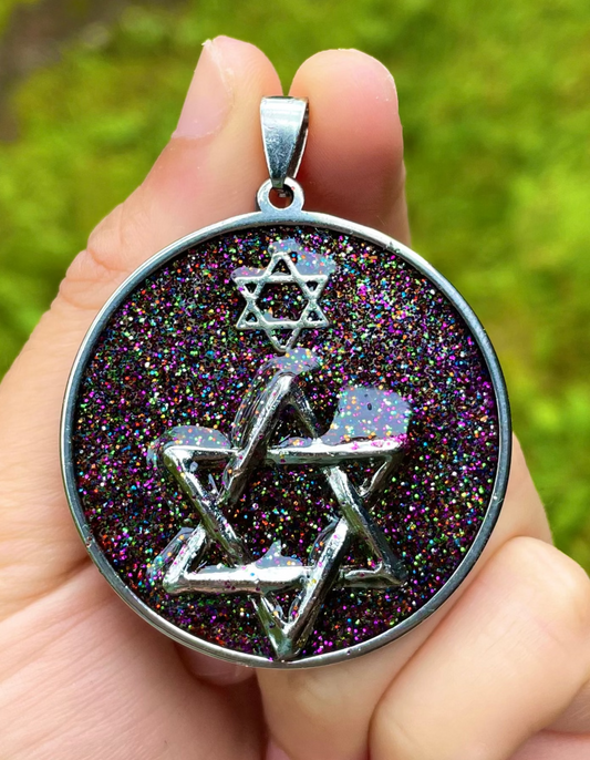 Far Galaxies: Double Magen David Glittery Resin Pendant set in round Stainless Steel Frame