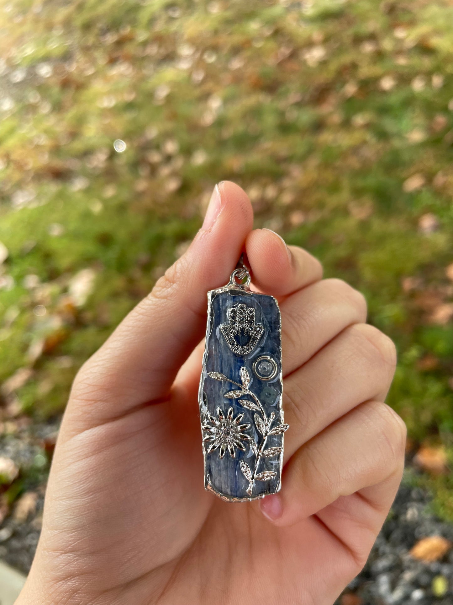Blue Calcite Pendant with Zirconia Hamsa and Silver Leaves