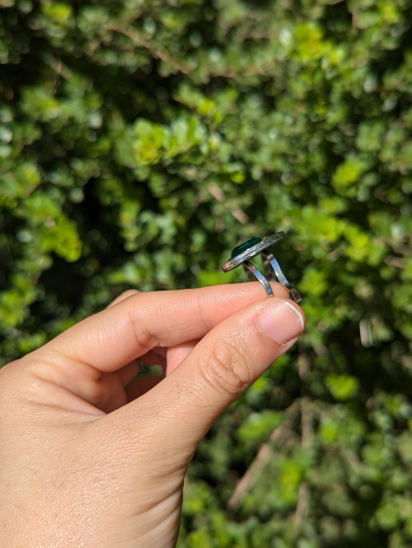 Israel Encapsulated: Tiny Israeli Flowers and Green Zirconia in Resin Stainless Steel Ring