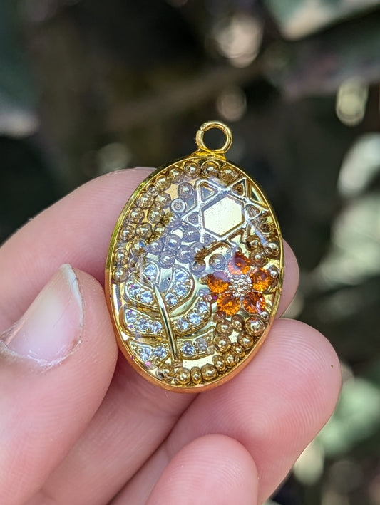 Ginger: Orange Flower Gold Plated Magen David and Beads Stainless Steel Pendant