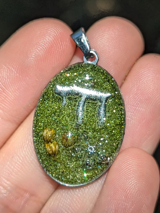 Moss: Shining Green, Silver Chai, Israeli Yellow Tiny Flowers and Silver Zirconia Flower in Oval Stainless Steel Resin Frame
