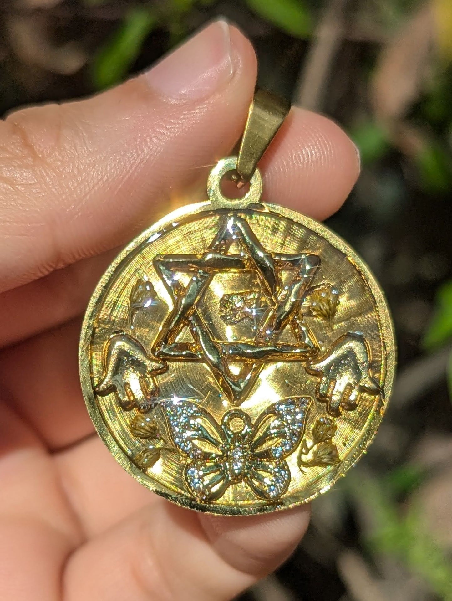 Zahara: Gold plated Round Magen David Double Hamsa Pendant with Israeli Flowers and Zirconia Butterfly