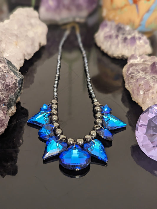 Night Love Composition: 9 Blue Heart, Star and Soft Triangle Pendants, Grey Hematite Styled Beads, Dark Blue Glass Beads.