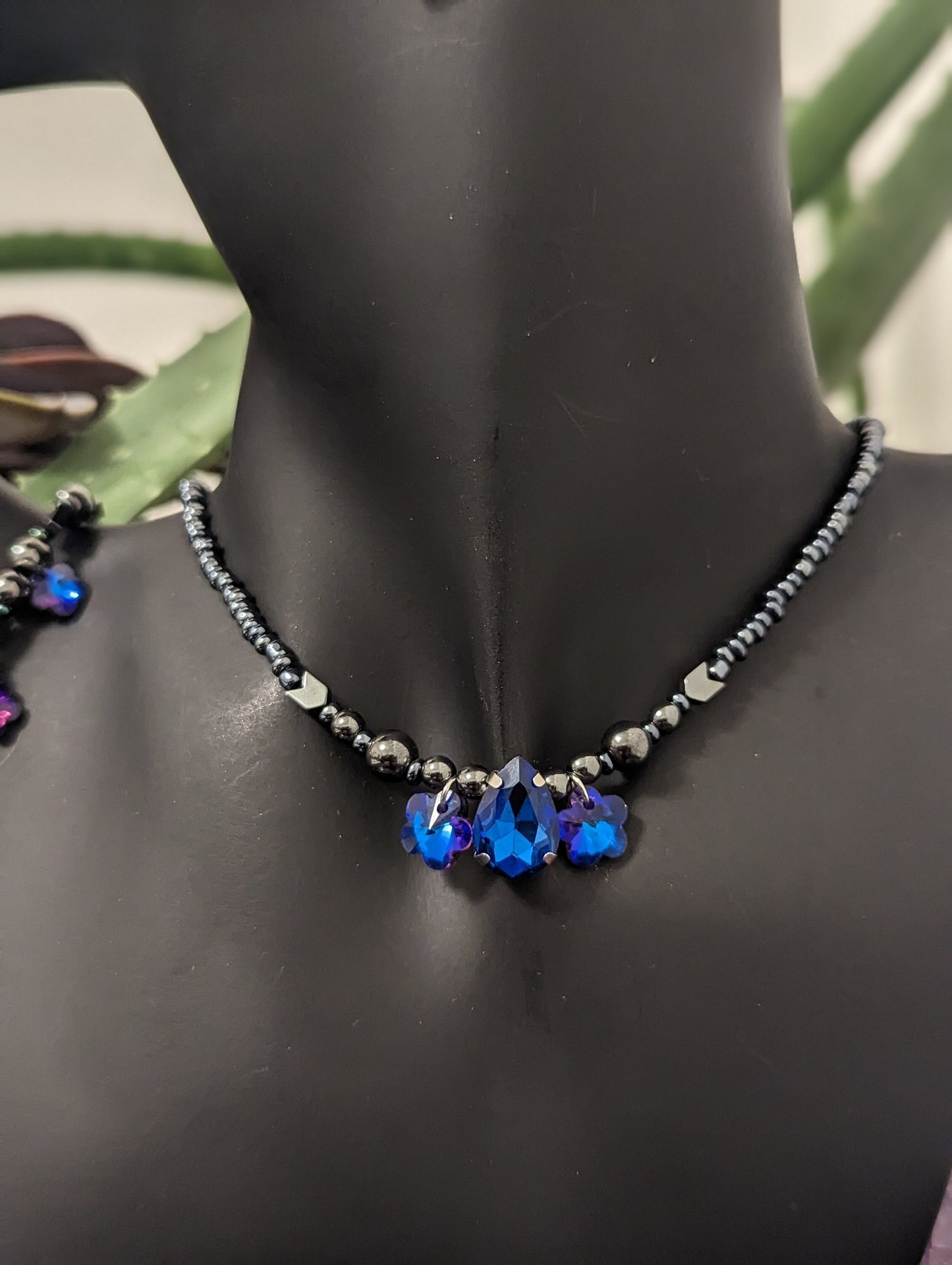 ISRAEL Water for Flowers: Blue Drop Pendant, 2 Purple Flower Pendants, Hematite Styled Arrow Beads and Dark Blue Glass Beads