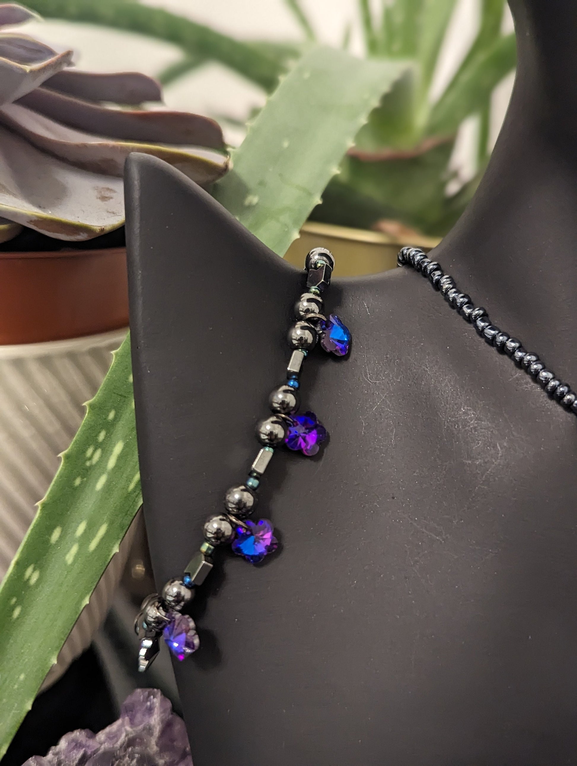 ISRAEL Water for Flowers: Blue Drop Pendant, 2 Purple Flower Pendants, Hematite Styled Arrow Beads and Dark Blue Glass Beads