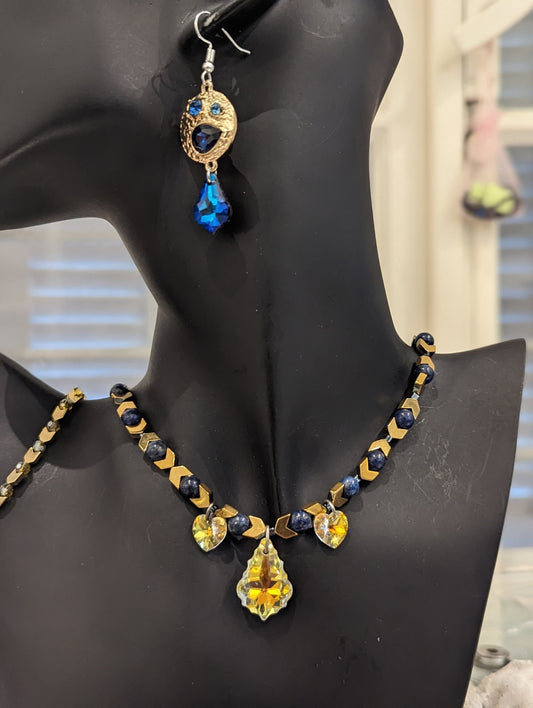 Blue Gold Set: Lapis Lazuli Gemstones, Golden Arrow Beads, Glass Baroque and Heart Pendants and Golden Earrings with Embedded Gems