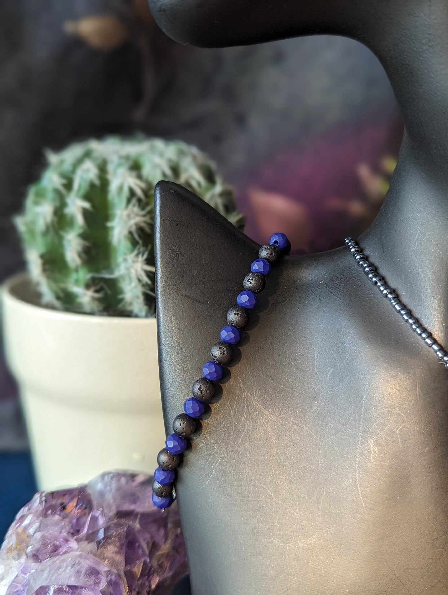 Sleepy Panda Set: Silver Panda Sleeping on a Tree Branch, Metals on a Round Blue Faceted Glass Pendant. Blue Earrings and Beaded Bracelet