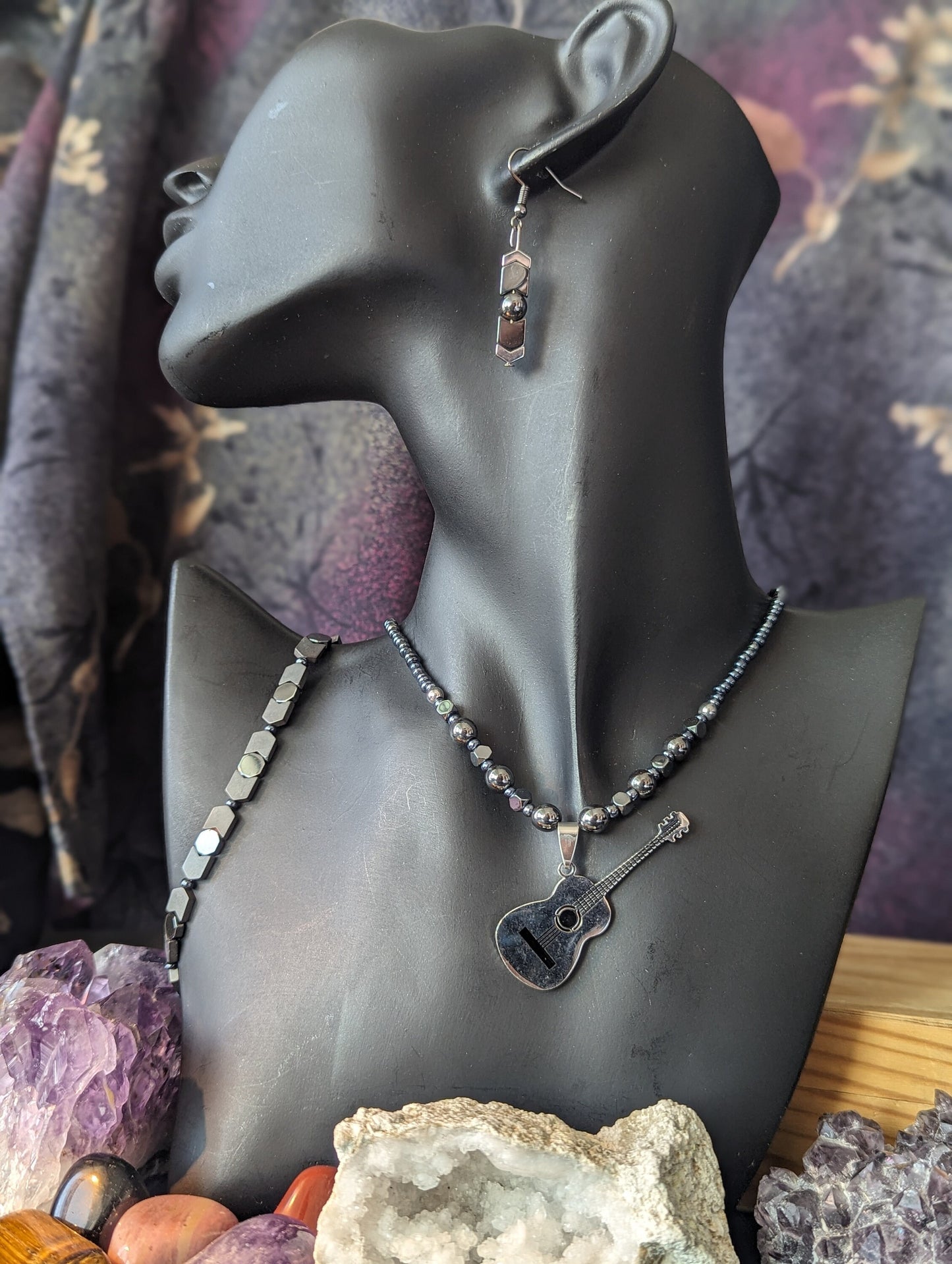 Silver Guitar Set: Silver Metallic Guitar Pendant, on a Silver Hematite Styled Beaded Necklace with Fitting Bracelet and Earrings