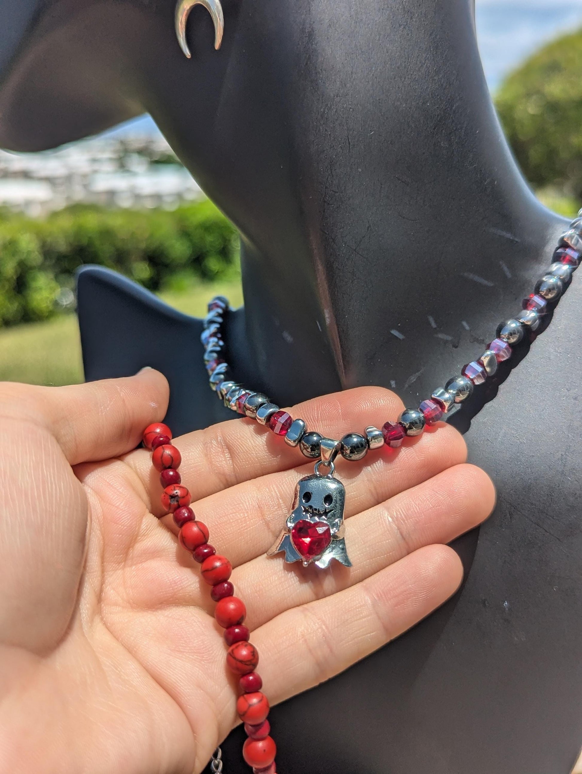 FANTASY WORLD Loveable Ghost Set: with silver ghost holding a red heart, beaded silver red necklace, crescent moon earrings and red bracelet