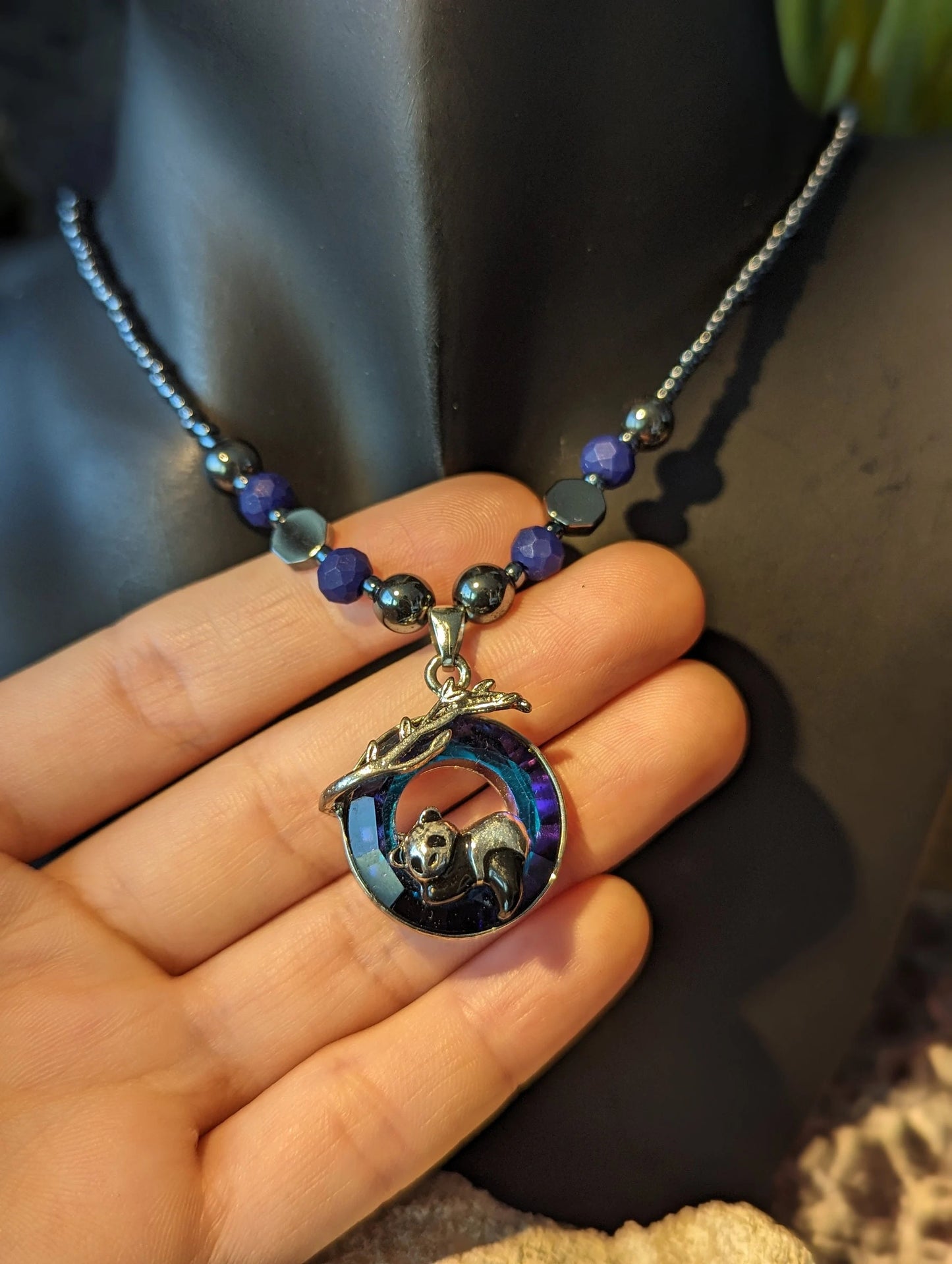 Sleepy Panda Set: Silver Panda Sleeping on a Tree Branch, Metals on a Round Blue Faceted Glass Pendant. Blue Earrings and Beaded Bracelet