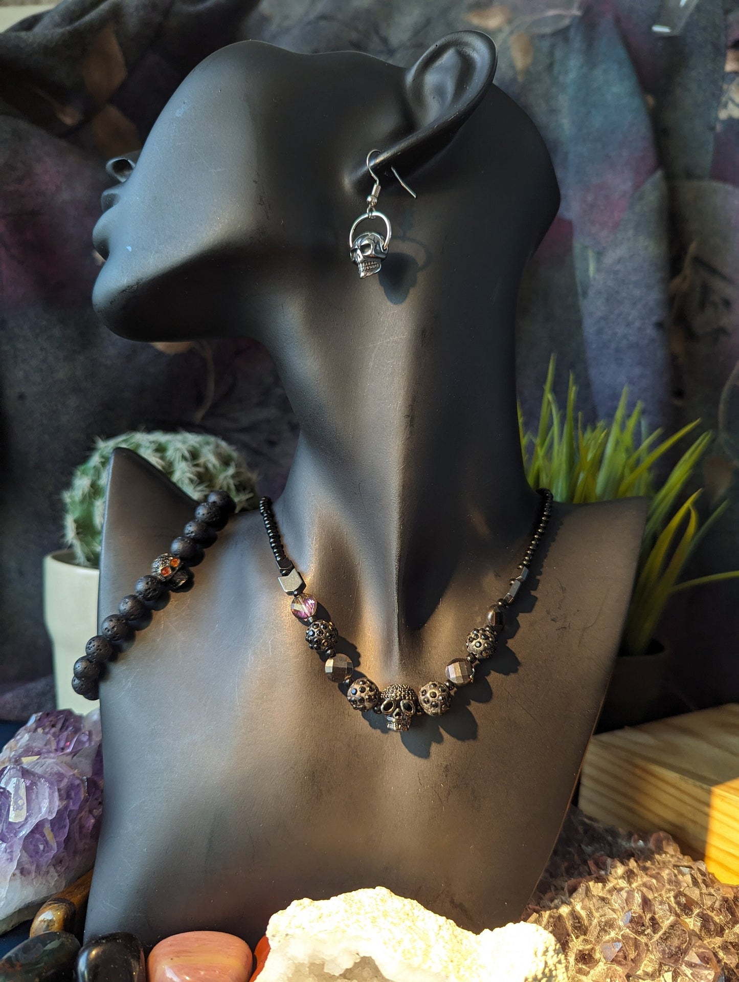 Skulls Set: Shimmering Skull Pendant, Purple Black Glass Beads, Shimmering Black Beads, Silver Skull Earrings and Orange Eyes Skull Bracelet