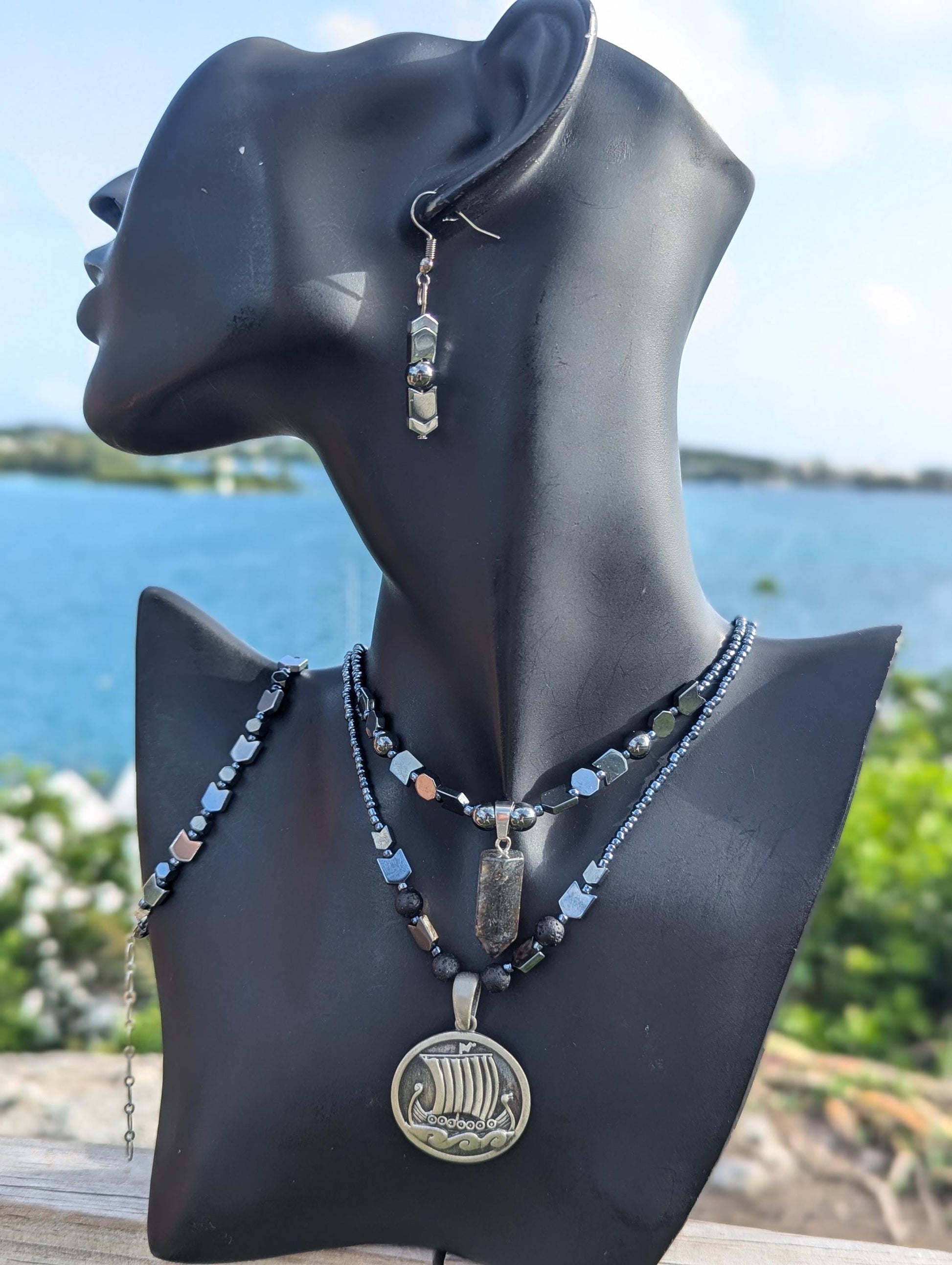 NORWAY Raven Skull Set: with Stainless Steel Raven Skull Pendant, Silver Arrow and Hematite Styled Beaded Necklace, Bracelet and Earrings