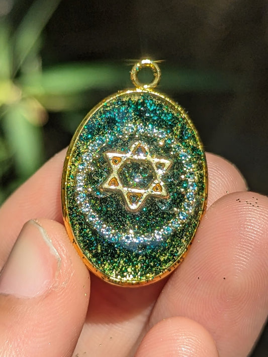 Ya'ar (Forest): Dark Green Shine and Gold Magen David, Zirconia Loop and Gold Plated Oval Resin Frame